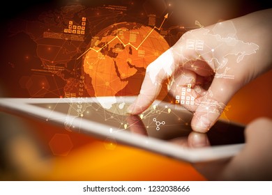 Hand using tablet with multinational worldwide estate report concept