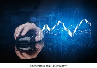 Hand using wireless mouse with statistical concept on dark background