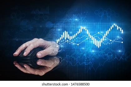 Hand using wireless mouse with statistical concept on dark background