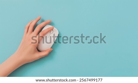 Hand view with white computer mouse on light blue background