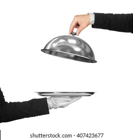 The Hand Of The Waiter Holding Cloche Over Empty Tray On An Isolated White Background. Concept Of First Class Service On White Background