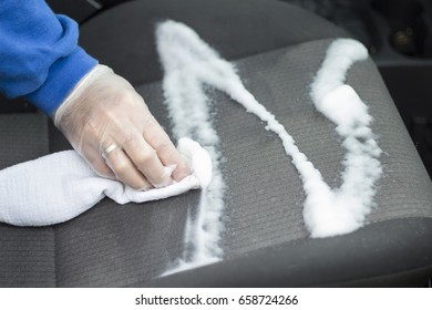 Hand Wash Car Upholstery With Washing Foam And Sponge.