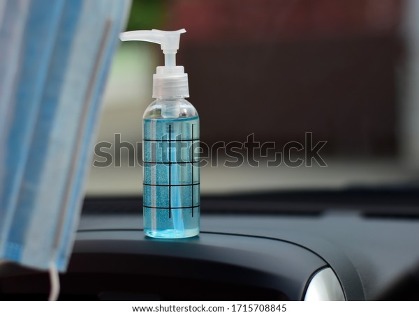 Hand wash gel and dust\
mask in the car