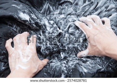 Hand Washing a Black Down Jacket at Home