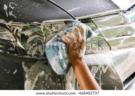 hand washing a car
