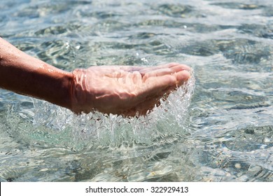 Hand And Water.