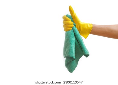 Hand wearing a cleaning glove showing thumb up; cleaning service concept