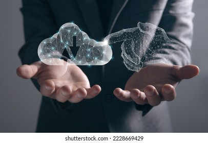 A hand from the web clicks on cloud storage. Man holding in his hand