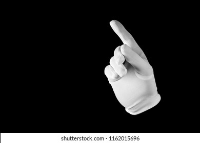 Hand in a white glove isolated on a black background. Gesture eye-catching. Gesticulation.