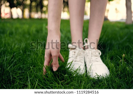   hand white grass sneakers                             