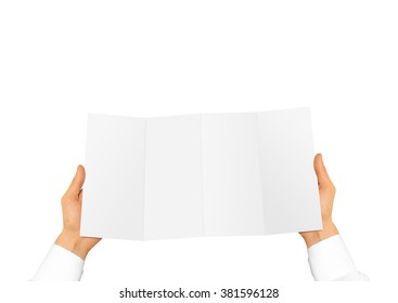 Hand in white shirt holding blank leaflet in the hand. Offset brochure presentation. Pamphlet hand man. Man show paper. Sheet template. Menu in hands. Booklet design. Fold paper sheet display.