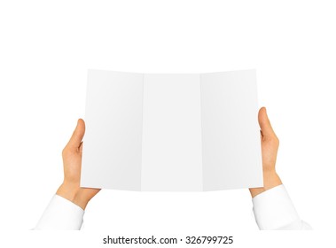 Hand In White Shirt Sleeve Holding Blank Offset Paper In The Hand. Empty Leaflet Presentation. Booklet Hand Man. Man Show Brochure Mock Up. Menu In Hands. Flyer Design. Fold Paper Sheet Display.