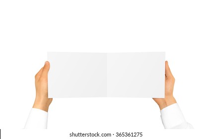 Hand In White Shirt Sleeve Holding Blank Booklet Card In The Hand. Offset Brochure Presentation. Pamphlet Hand Man. Man Show Paper. Sheet Template. Booklet Design. Fold Paper Sheet Display.