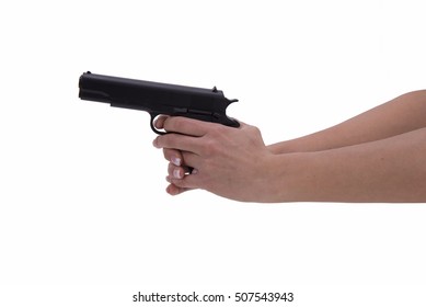 Hand Of Woman With Gun On White Background