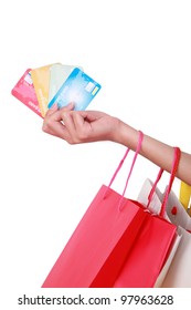 Hand Woman Holding Credit Card And Shopping Bags