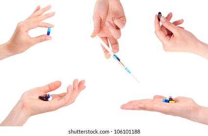 Hand Of A Woman Holding A Pill, Isolated Against White Background