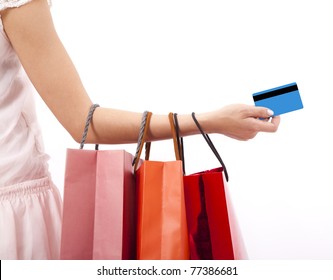 Hand Of Woman Holding Shopping Bags And Credit Card