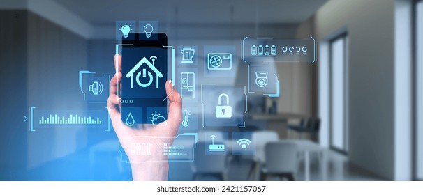 Hand of woman holding smartphone with smart home app standing in blurry kitchen. Concept of IoT internet of things - Powered by Shutterstock