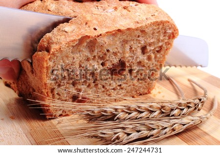 Similar – Foto Bild gebackenes Roggenbrot liegt Mehl auf einem Textiltuch.