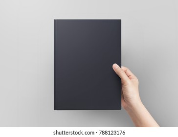 Hand Women Holding Black Book Cover Blank Top View.  Blank Book Cover.