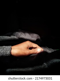 Hand With Woolen Jacket.  Warm Clothes