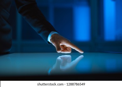 The hand working with a touchscreen