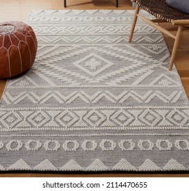 Hand woven wool living room rug - Shutterstock ID 2114470655