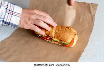 Hand Wrap And Package The Sandwich Into The Paper, Prepare Food For Lunch