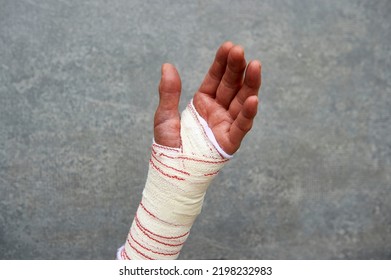 Hand And Wrist Of Elderly Woman Bandaged For Sprain