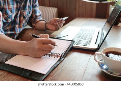 Hand Write Note On Paper With Hold Credit Card With Laptop,hands Holding Credit Card Shopping Online,personal Loans,businessman Hand Busy Using Laptop At Office Desk,online Lifestyle
