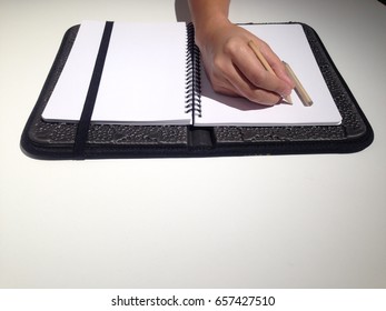 Hand write on paper notepad,copy space