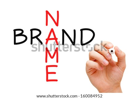 Hand writing Brand Name Crossword with black marker on transparent wipe board.