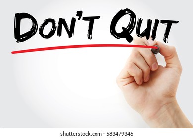 Hand writing Do Not Quit with marker, concept background