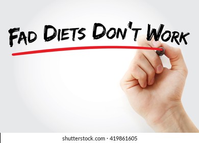 Hand Writing Fad Diets Don't Work With Marker, Health Concept Background