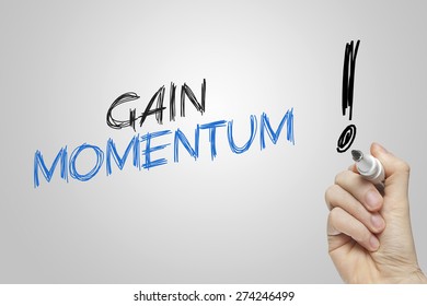 Hand Writing Gain Momentum On Grey Background