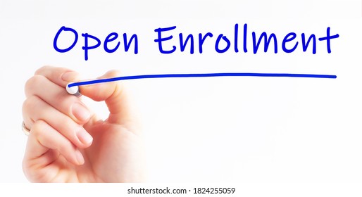 hand writing inscription Open Enrollment with blue marker, concept