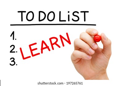 Hand writing Learn in To Do List with red marker isolated on white.
