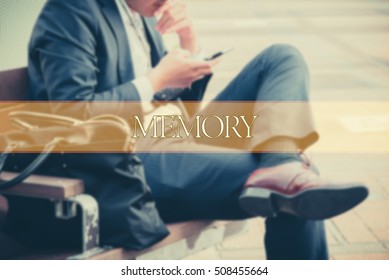Hand writing MEMORY  with the abstract background. The word MEMORY represent the meaning of word as concept in stock photo.