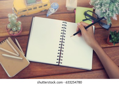 Hand Writing On Her Private Notbook Mockup Focus At The Center Of Picture , Education Concept