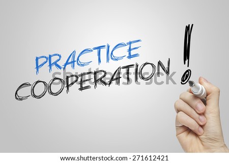 Hand writing practice cooperation on grey background