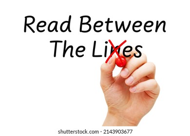 Hand writing Read Between The Lies changing the usually used word in the original idiom Lines to Lies. Concept about fake news, hoax, propaganda, disinformation, and misinformation.