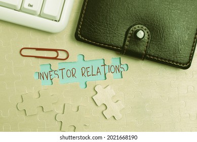 Hand Writing Sign Investor Relations. Business Overview Management Responsibility That Integrates Finance Building An Unfinished White Jigsaw Pattern Puzzle With Missing Last Piece