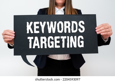 Hand Writing Sign Keywords TargetingUse Relevant Words To Get High Ranking In Search Engines. Business Concept Use Relevant Words To Get High Ranking In Search Engines