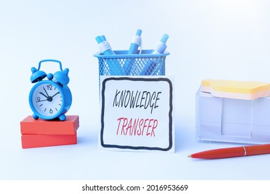 Hand Writing Sign Knowledge Transfer. Business Idea Sharing Or Disseminating Of Knowledge And Experience Tidy Workspace Setup Writing Desk Tools And Equipment Time Management