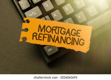 Hand Writing Sign Mortgage Refinancing. Business Approach Process Of Replacement Of An Existing Debt Obligation Connecting With Online Friends, Making Acquaintances On The Internet