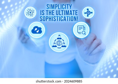 Hand Writing Sign Simplicity Is The Ultimate Sophistication. Business Concept Simplify Presentations Best Result Lady Holding Tablet Pressing On Virtual Button Showing Futuristic Tech.