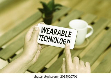 Hand Writing Sign Wearable Technology. Business Approach Electronic Devices That Can Be Worn As Accessories Voice And Video Calling Capabilities Connecting People Together