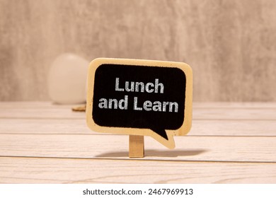 Hand writing the text: Lunch and Learn.