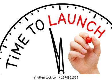 Hand writing Time to Launch clock concept with marker on transparent wipe board.
