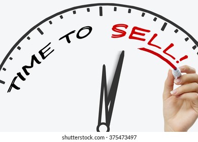 Hand writing time to sell concept with red marker on transparent wipe board. - Shutterstock ID 375473497
